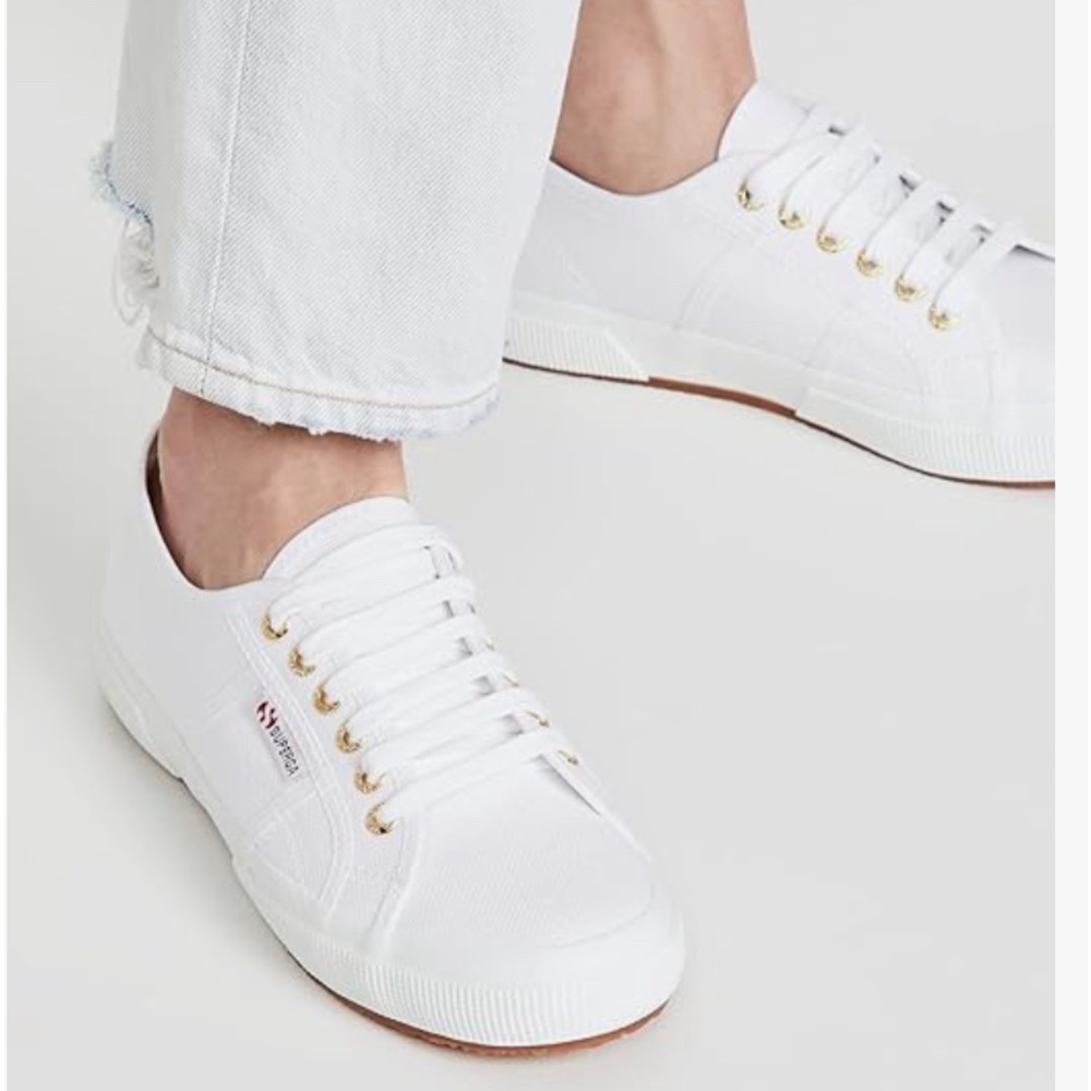 Superga 2750 Cotu Classic 2 tennis shoes with gold lace holes.